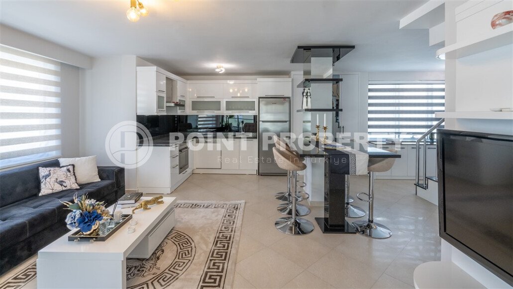 View comfortable penthouse 4+1, 240 m², on the first coastline in the Alanya region - Oba.-id-2499-photo-1