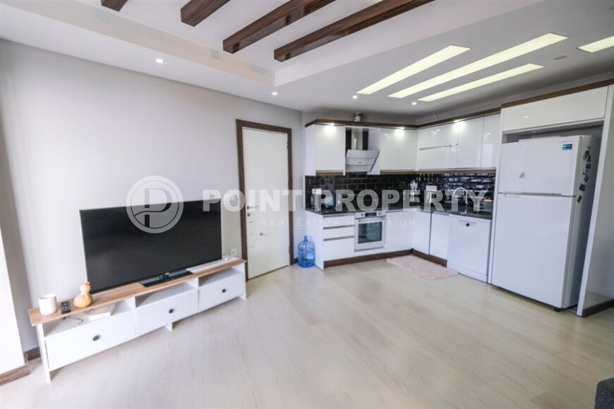 Elegant 90 m² apartment in Mahmutlar with a rooftop pool and atrium entrance-id-10534-photo-4