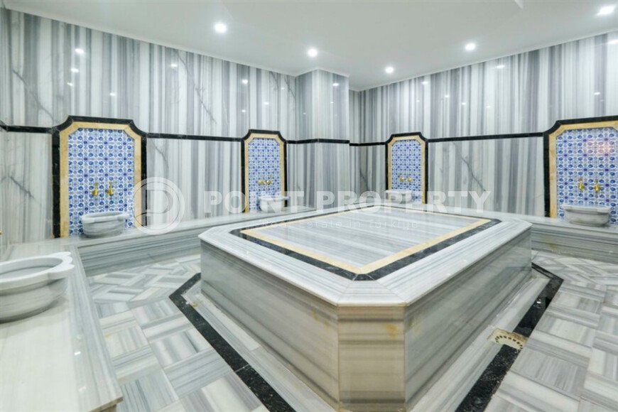 Elegant 90 m² apartment in Mahmutlar with a rooftop pool and atrium entrance-id-10534-photo-16