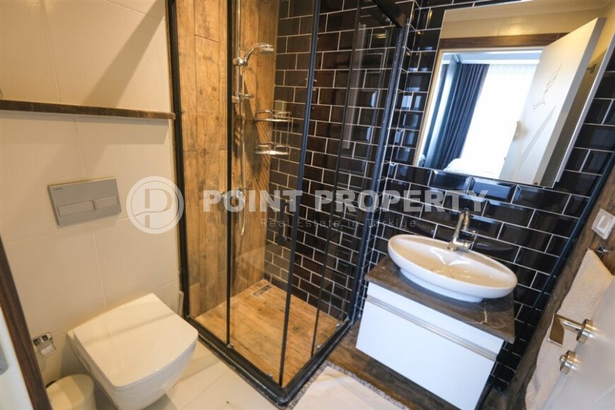 Elegant 90 m² apartment in Mahmutlar with a rooftop pool and atrium entrance-id-10534-photo-18