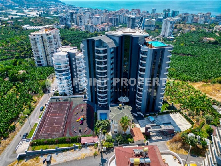 Elegant 90 m² apartment in Mahmutlar with a rooftop pool and atrium entrance-id-10534-photo-32