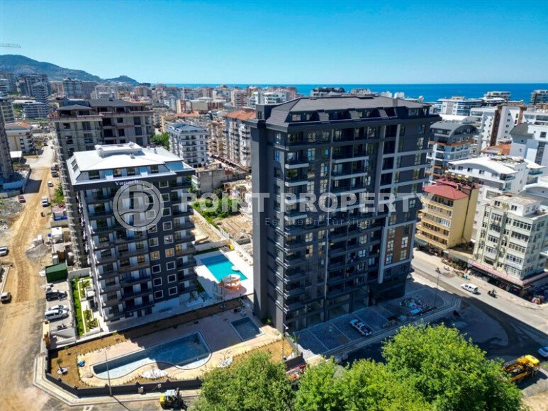 New spacious duplex of 135 m² in Mahmutlar with sea views and modern infrastructure-id-10535-photo-16