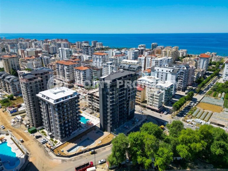 New spacious duplex of 135 m² in Mahmutlar with sea views and modern infrastructure-id-10535-photo-17