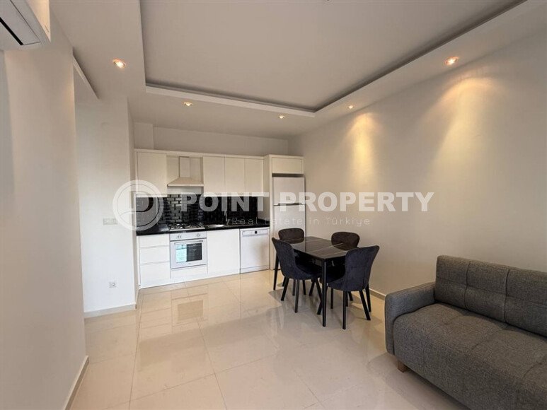 Современная квартира 55 м² в новом комплексе района Махмутлар-id-10536-фото-1