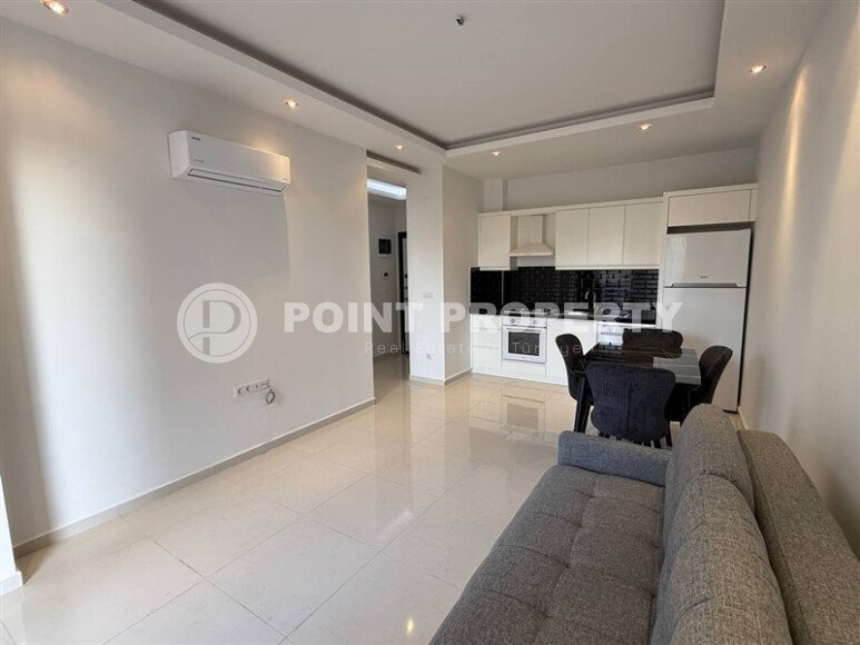 Современная квартира 55 м² в новом комплексе района Махмутлар-id-10536-фото-2