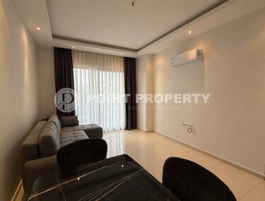 Современная квартира 55 м² в новом комплексе района Махмутлар-id-10536-фото-3