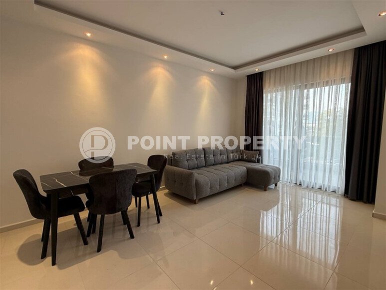 Современная квартира 55 м² в новом комплексе района Махмутлар-id-10536-фото-4