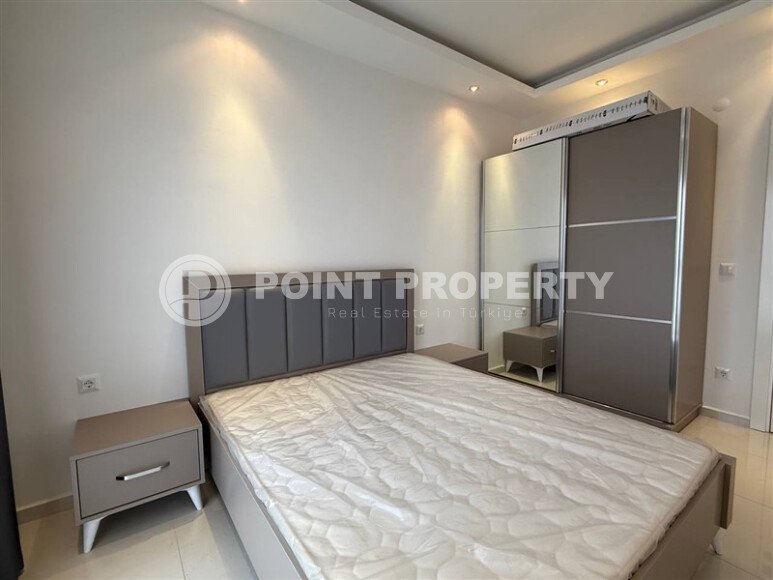 Современная квартира 55 м² в новом комплексе района Махмутлар-id-10536-фото-11