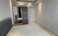 Современная квартира 55 м² в новом комплексе района Махмутлар-id-10536-фото-12