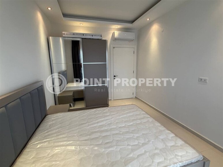 Современная квартира 55 м² в новом комплексе района Махмутлар-id-10536-фото-12