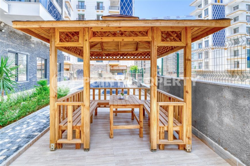 Современная квартира 55 м² в новом комплексе района Махмутлар-id-10536-фото-16