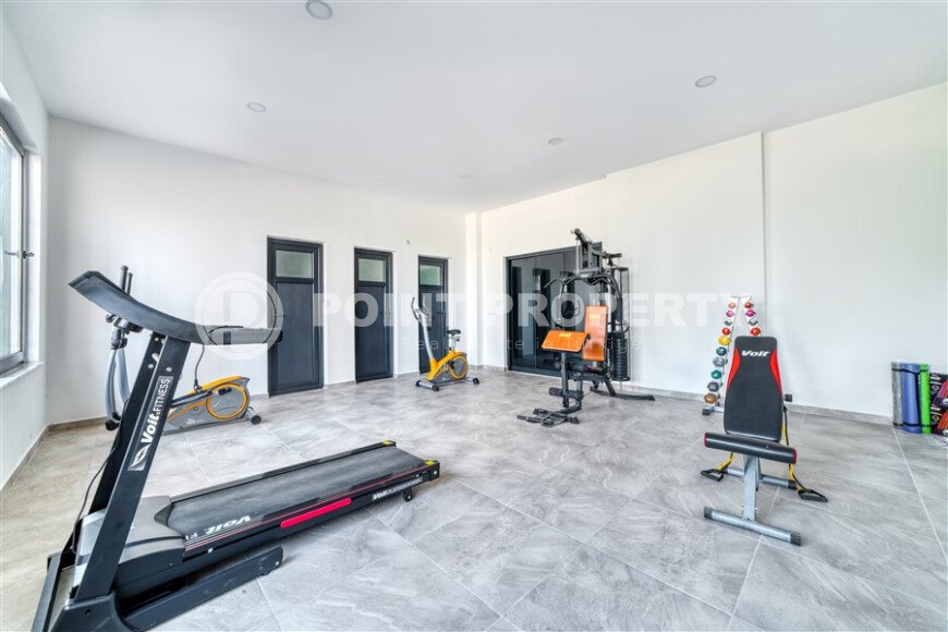 Современная квартира 55 м² в новом комплексе района Махмутлар-id-10536-фото-17