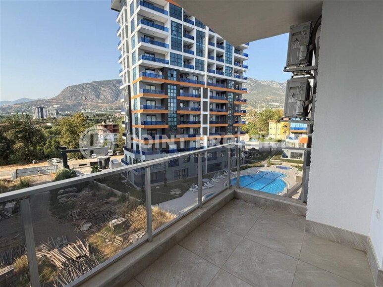 Современная квартира 55 м² в новом комплексе района Махмутлар-id-10536-фото-22