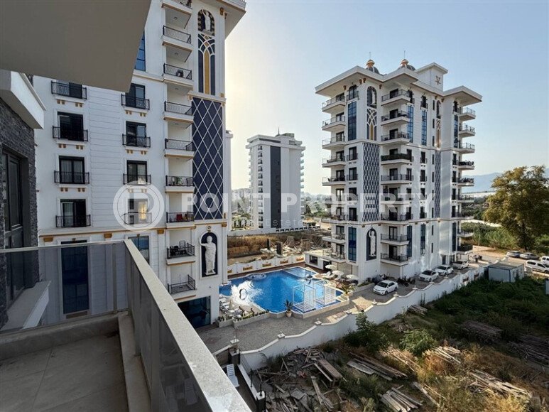 Современная квартира 55 м² в новом комплексе района Махмутлар-id-10536-фото-24