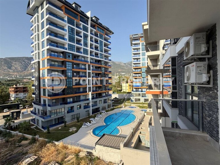 Современная квартира 55 м² в новом комплексе района Махмутлар-id-10536-фото-26