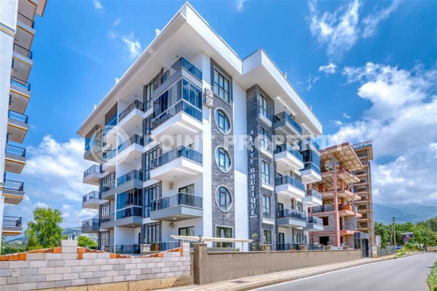 Современная квартира 55 м² в новом комплексе района Махмутлар-id-10536-фото-27