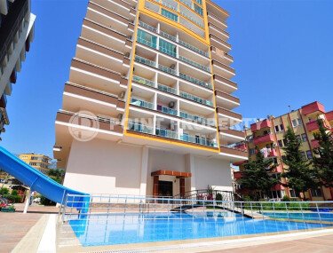 Уютная студия 30 м² с застеклённым балконом, район Махмутлар-id-10543-фото-1