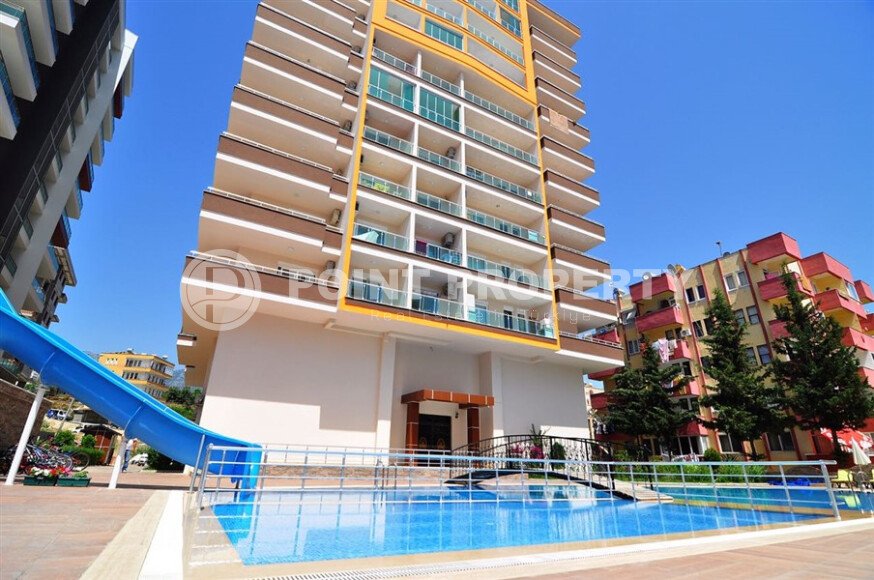 Уютная студия 30 м² с застеклённым балконом, район Махмутлар-id-10543-фото-1