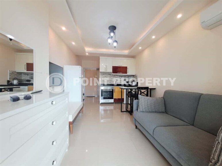 Уютная студия 30 м² с застеклённым балконом, район Махмутлар-id-10543-фото-2