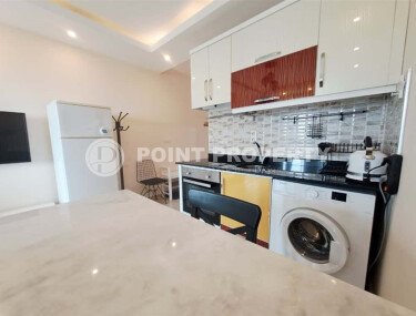 Уютная студия 30 м² с застеклённым балконом, район Махмутлар-id-10543-фото-5