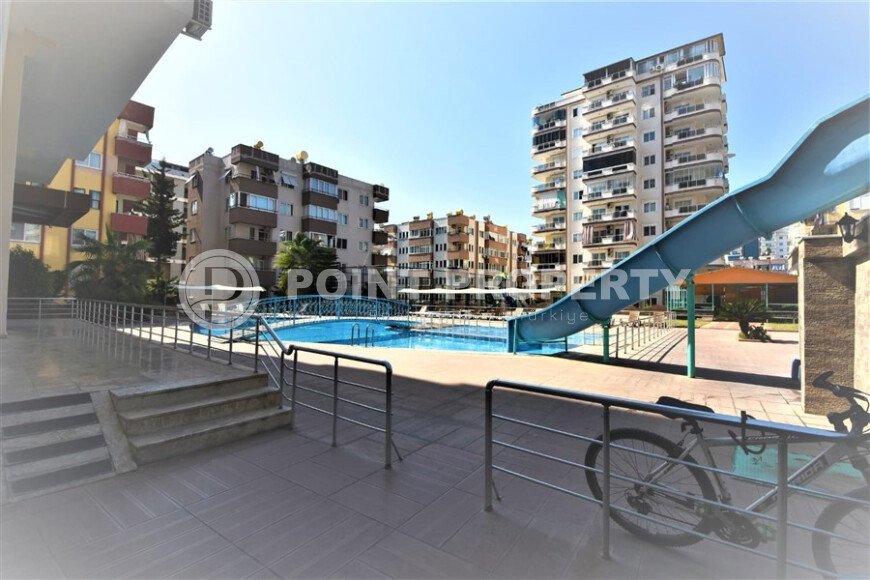 Уютная студия 30 м² с застеклённым балконом, район Махмутлар-id-10543-фото-13