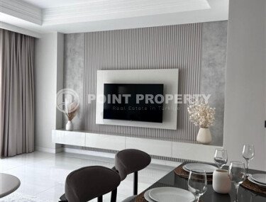 Стильная квартира 129 м² в комплексе с международным отелем, с возможностью краткосрочной аренды, район Тюрклер-id-10547-фото-3