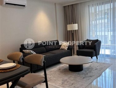 Стильная квартира 129 м² в комплексе с международным отелем, с возможностью краткосрочной аренды, район Тюрклер-id-10547-фото-4