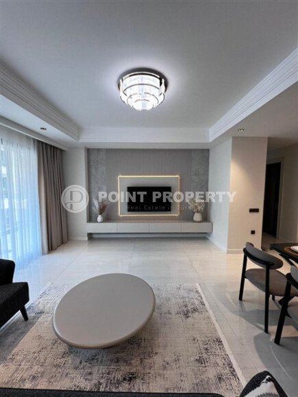 Стильная квартира 129 м² в комплексе с международным отелем, с возможностью краткосрочной аренды, район Тюрклер-id-10547-фото-5