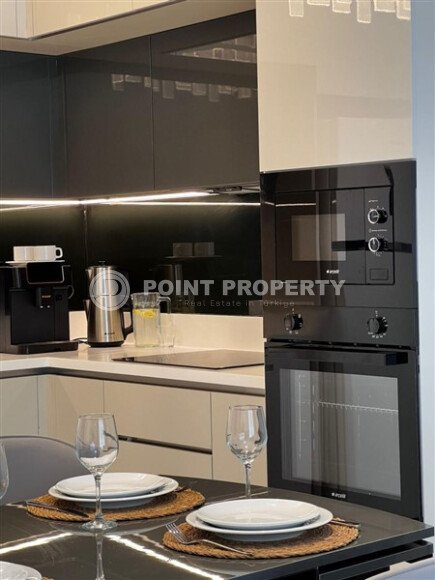 Стильная квартира 129 м² в комплексе с международным отелем, с возможностью краткосрочной аренды, район Тюрклер-id-10547-фото-6