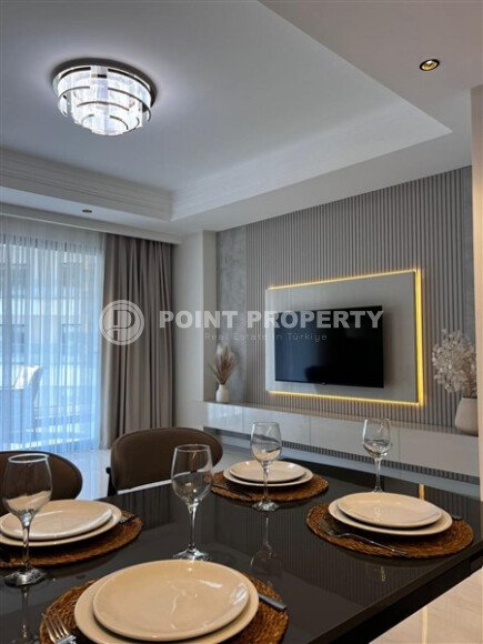 Стильная квартира 129 м² в комплексе с международным отелем, с возможностью краткосрочной аренды, район Тюрклер-id-10547-фото-7