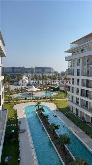 Стильная квартира 129 м² в комплексе с международным отелем, с возможностью краткосрочной аренды, район Тюрклер-id-10547-фото-11