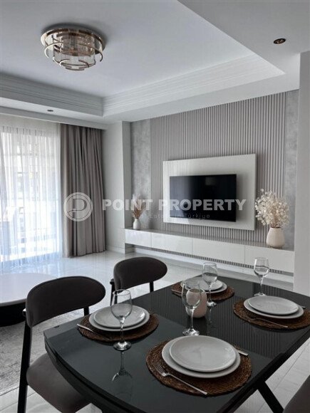 Стильная квартира 129 м² в комплексе с международным отелем, с возможностью краткосрочной аренды, район Тюрклер-id-10547-фото-12