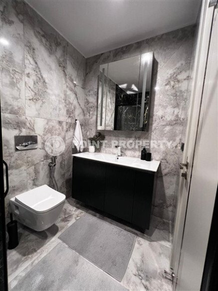 Стильная квартира 129 м² в комплексе с международным отелем, с возможностью краткосрочной аренды, район Тюрклер-id-10547-фото-15