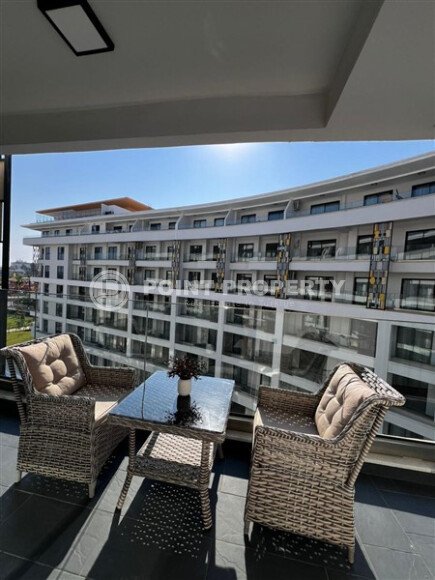 Стильная квартира 129 м² в комплексе с международным отелем, с возможностью краткосрочной аренды, район Тюрклер-id-10547-фото-17