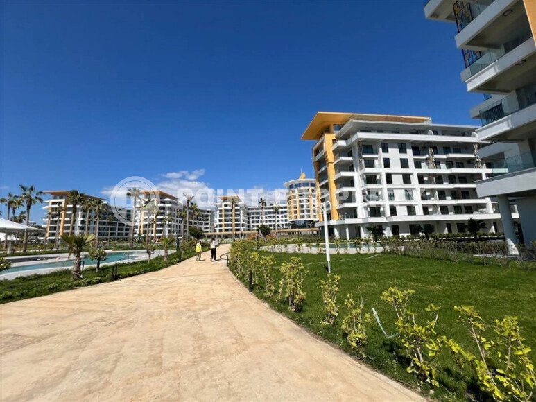 Стильная квартира 129 м² в комплексе с международным отелем, с возможностью краткосрочной аренды, район Тюрклер-id-10547-фото-20