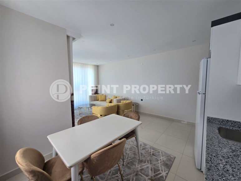 Светлая квартира 85 м² с частичным видом на море, район Каргыджак-id-10557-photo-2