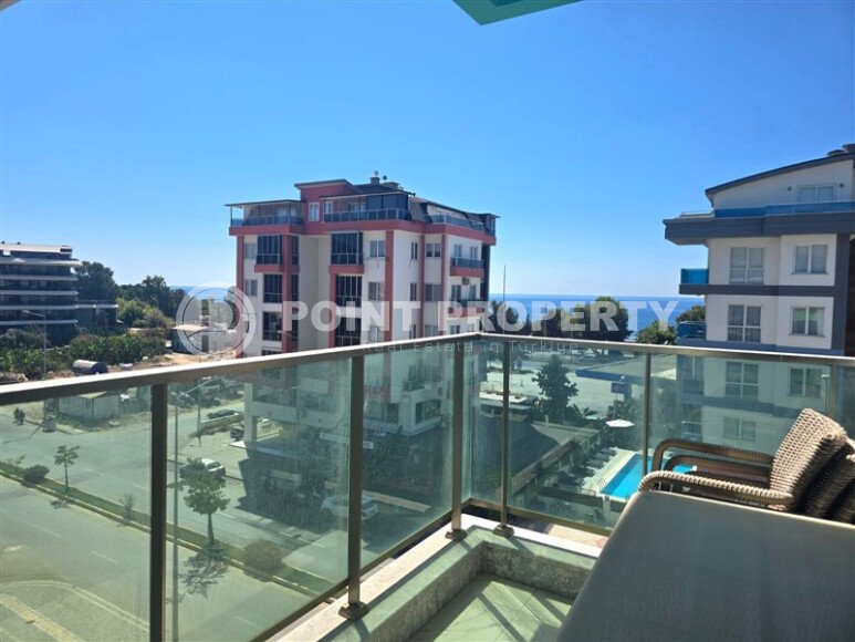 Светлая квартира 85 м² с частичным видом на море, район Каргыджак-id-10557-photo-4