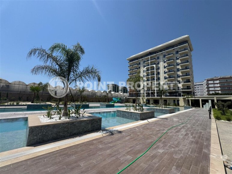 Новая квартира 90 м² с частичным видом на море, район Демирташ-id-10559-photo-1