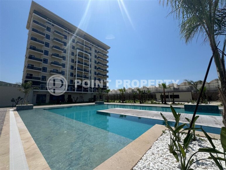 Новая квартира 90 м² с частичным видом на море, район Демирташ-id-10559-photo-5