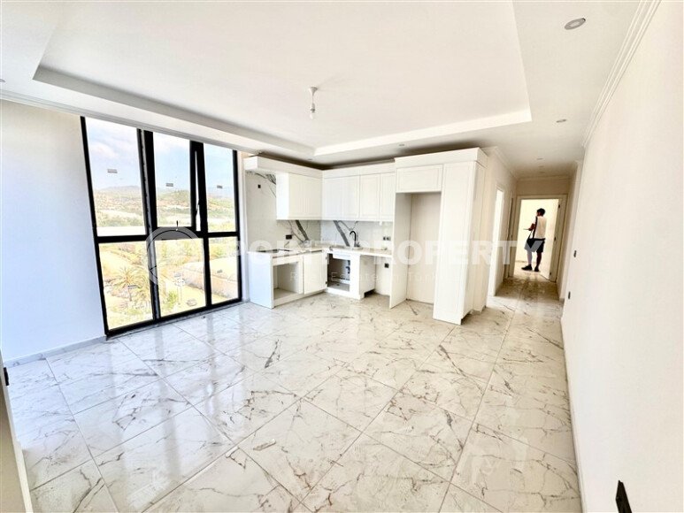 Новая квартира 90 м² с частичным видом на море, район Демирташ-id-10559-photo-9