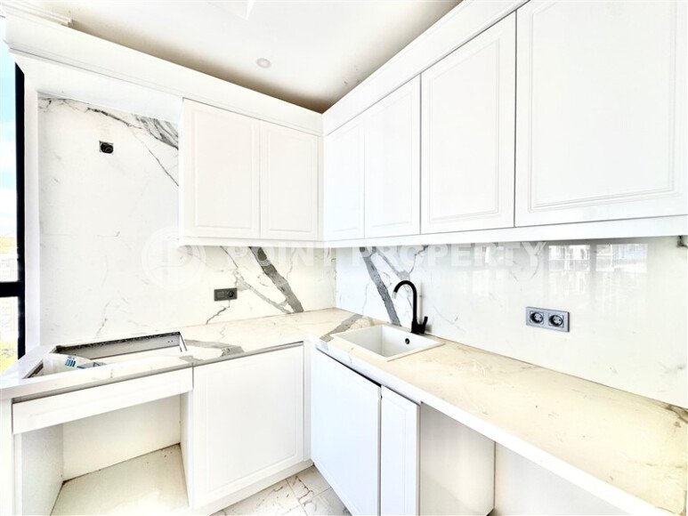 Новая квартира 90 м² с частичным видом на море, район Демирташ-id-10559-photo-10