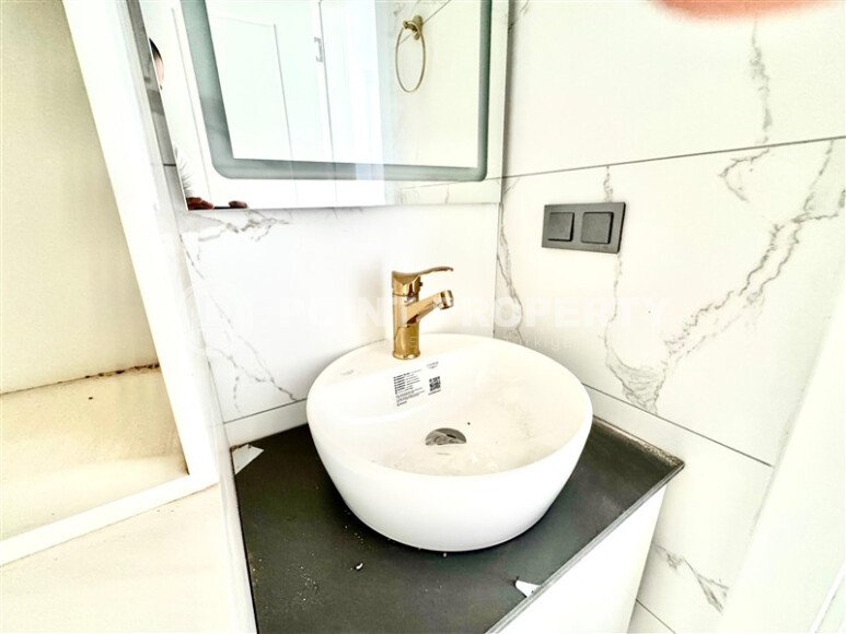 Новая квартира 90 м² с частичным видом на море, район Демирташ-id-10559-photo-15