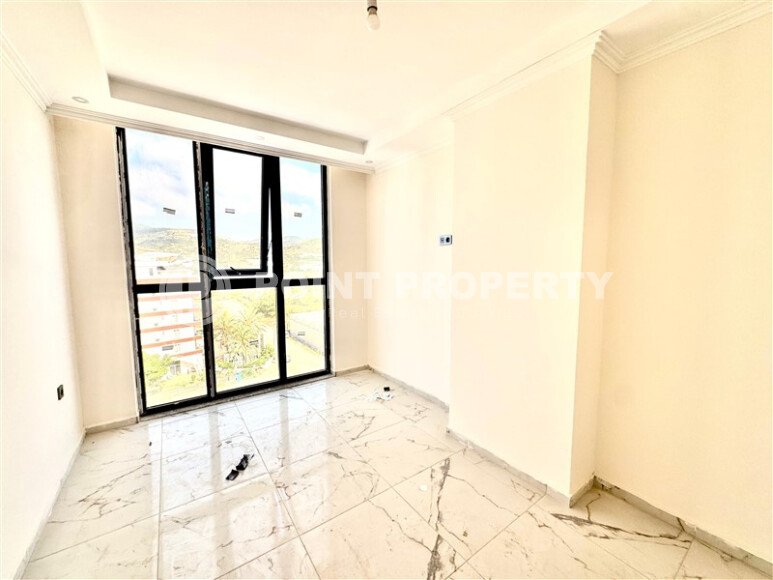 Новая квартира 90 м² с частичным видом на море, район Демирташ-id-10559-photo-16