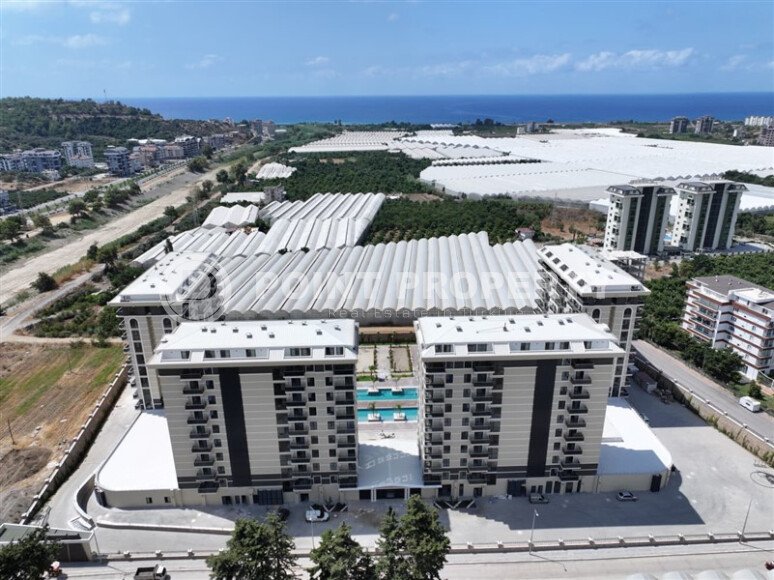 Новая квартира 90 м² с частичным видом на море, район Демирташ-id-10559-photo-25