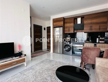 Уютная квартира 55 м² в жилом комплексе с инфраструктурой, район Махмутлар-id-10563-фото-2