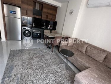 Уютная квартира 55 м² в жилом комплексе с инфраструктурой, район Махмутлар-id-10563-фото-2