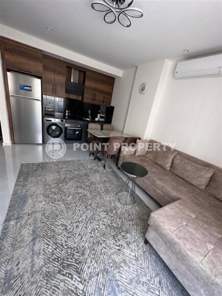 Уютная квартира 55 м² в жилом комплексе с инфраструктурой, район Махмутлар-id-10563-фото-2