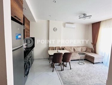 Уютная квартира 55 м² в жилом комплексе с инфраструктурой, район Махмутлар-id-10563-фото-4