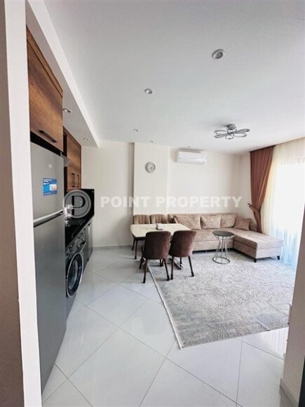 Уютная квартира 55 м² в жилом комплексе с инфраструктурой, район Махмутлар-id-10563-фото-4