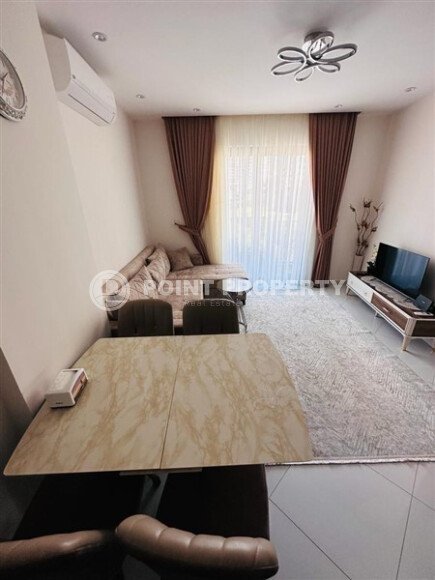 Уютная квартира 55 м² в жилом комплексе с инфраструктурой, район Махмутлар-id-10563-фото-6